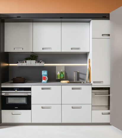 Compact kitchenette front open door view