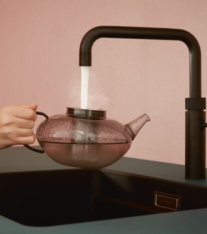 Minimal kitchen design - black tap and sink