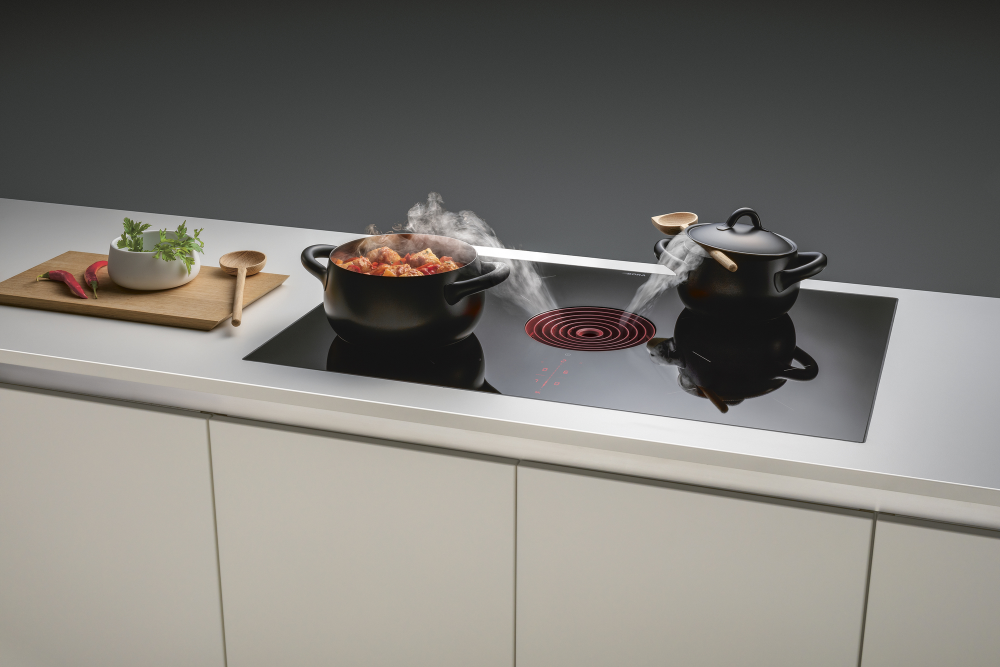 Induction Hob with Integrated Extractor in Red - BORA Pure