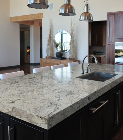 White Worktop with Cream and Black Contrast with Polished Finish