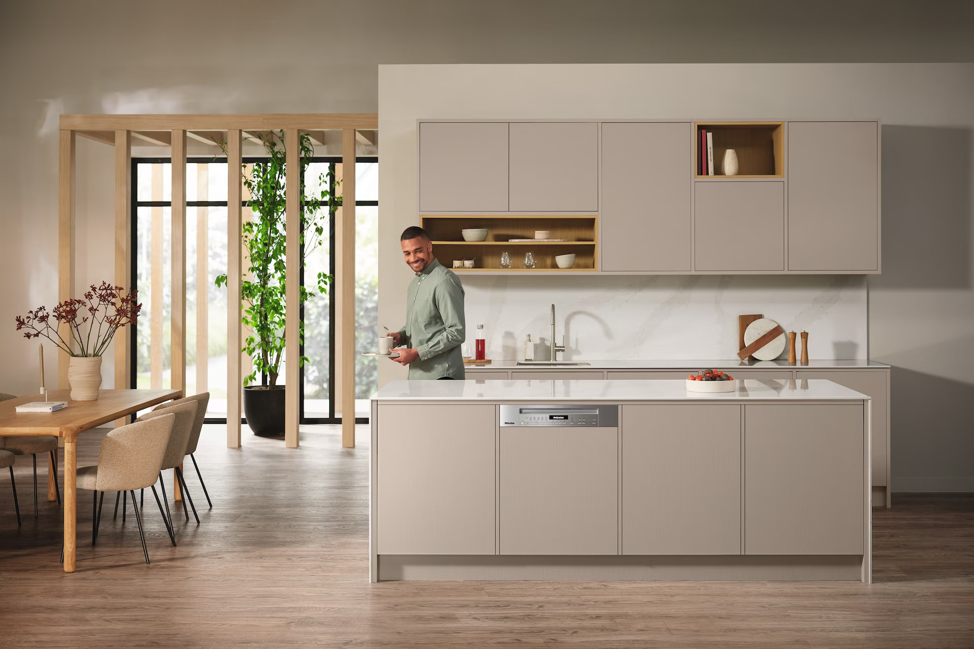 Miele Built In Semi Integrated Dishwasher with Man Walking By