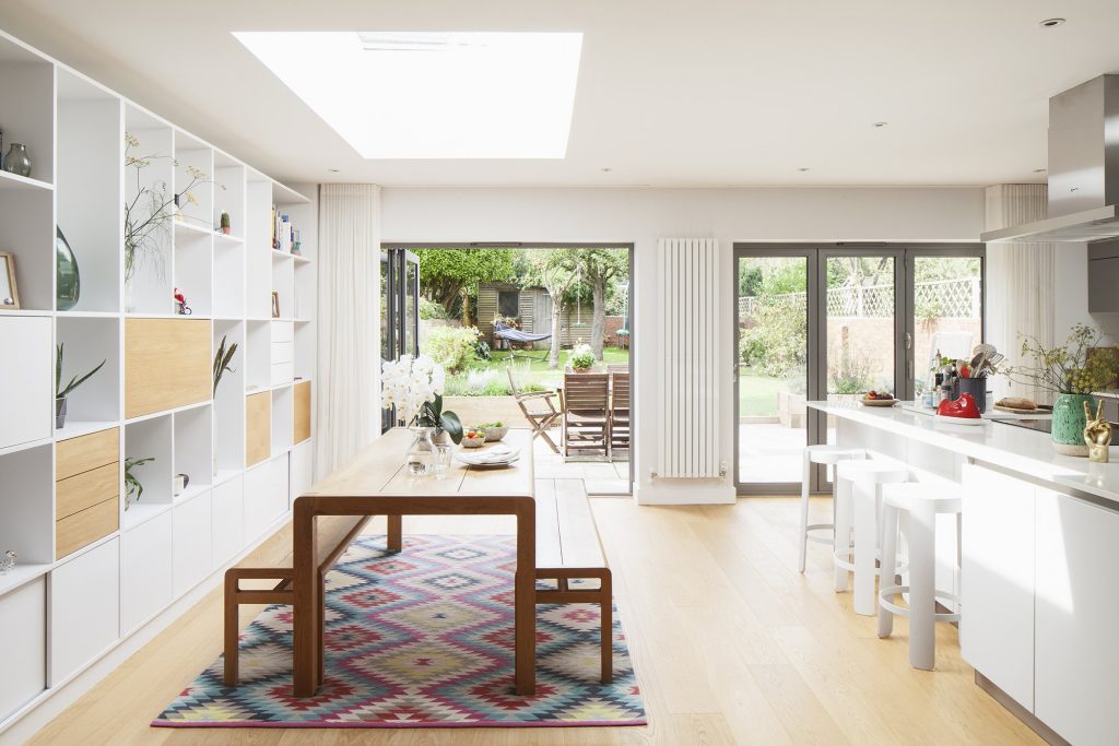 Open-plan kitchen and dining area leading to the garden